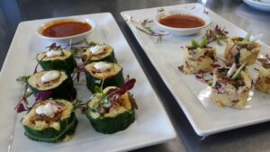 Appetiser platters with bowls of sauce