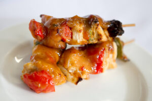 Chicken sosatie plated platter food